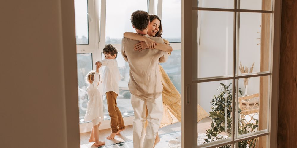 young family embracing