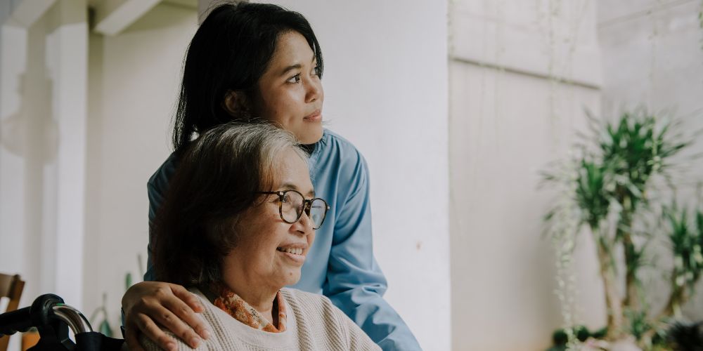Woman with her elderly mother
