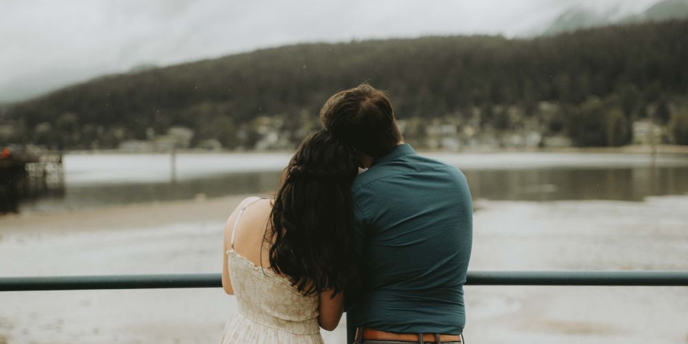 Young couple looking into distance