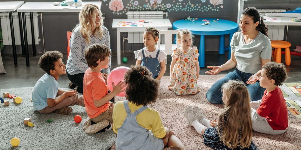 Kids-sitting-in-circle-at-daycare
