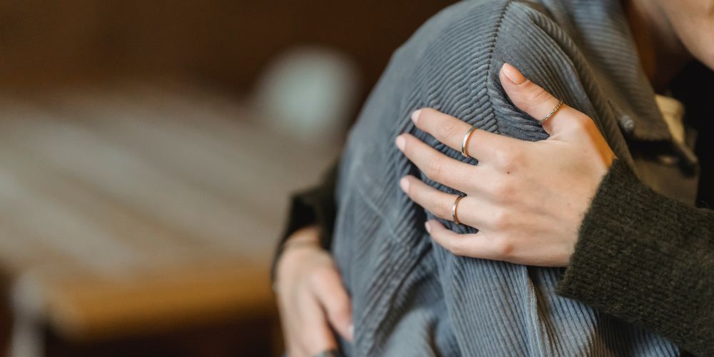 two people embrace in a hug