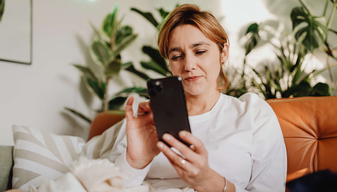 Woman using her mobile phone.