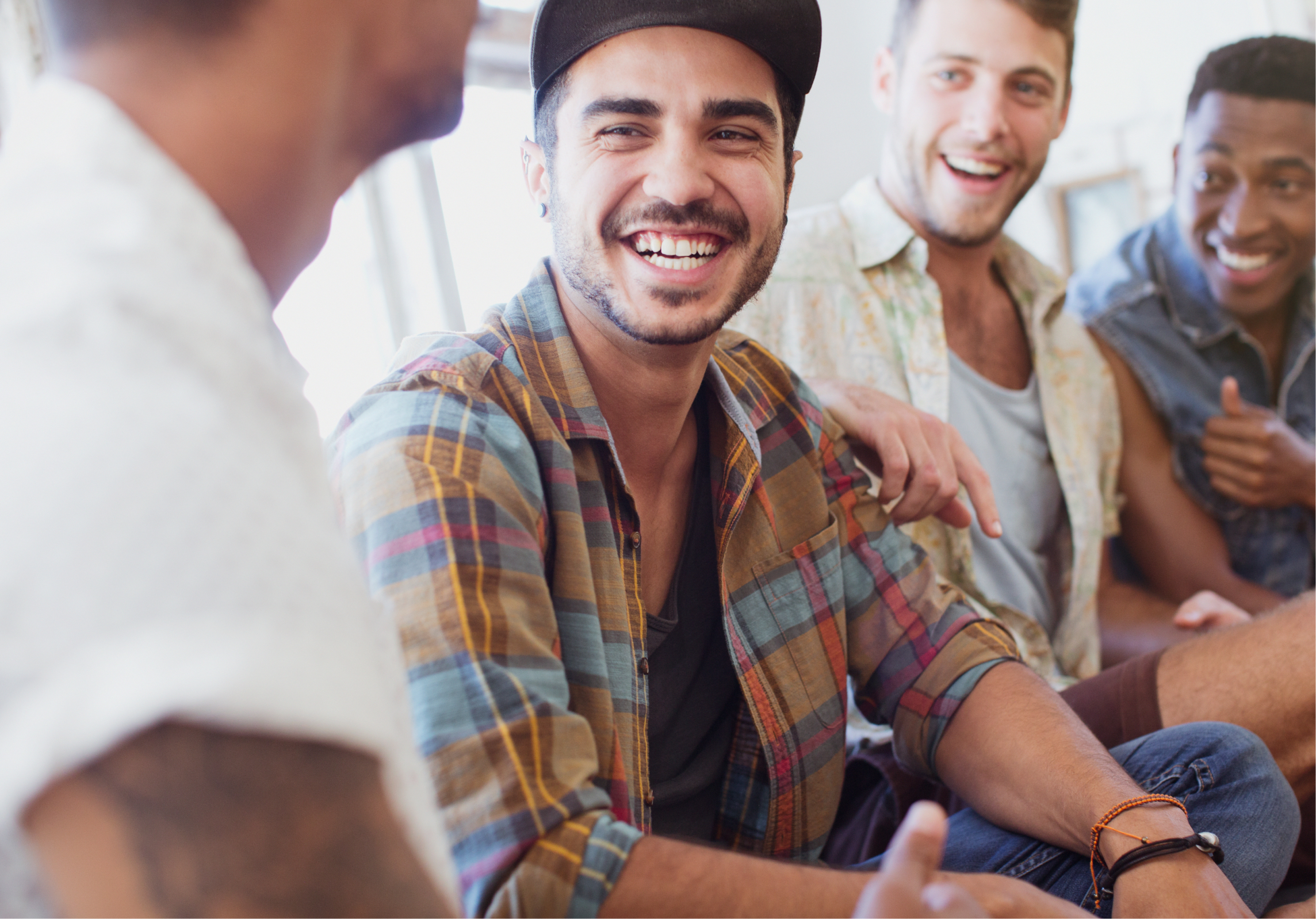 Group of young men smiling