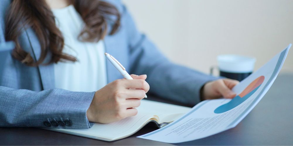 Person marking a report