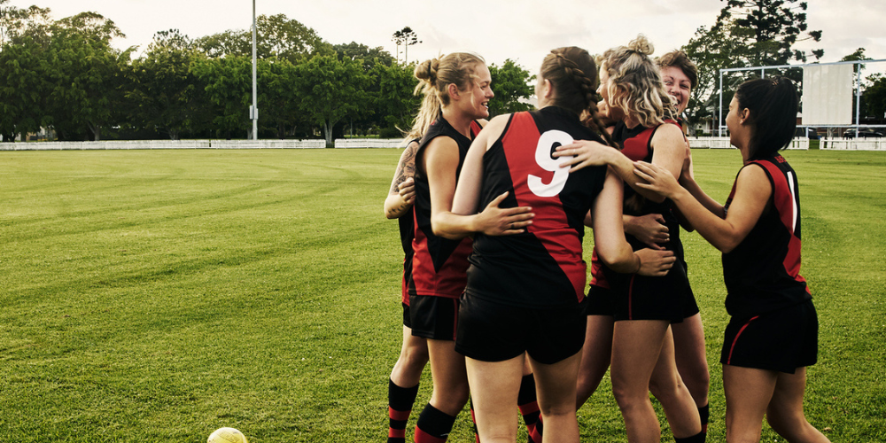 Women sports team celebrating