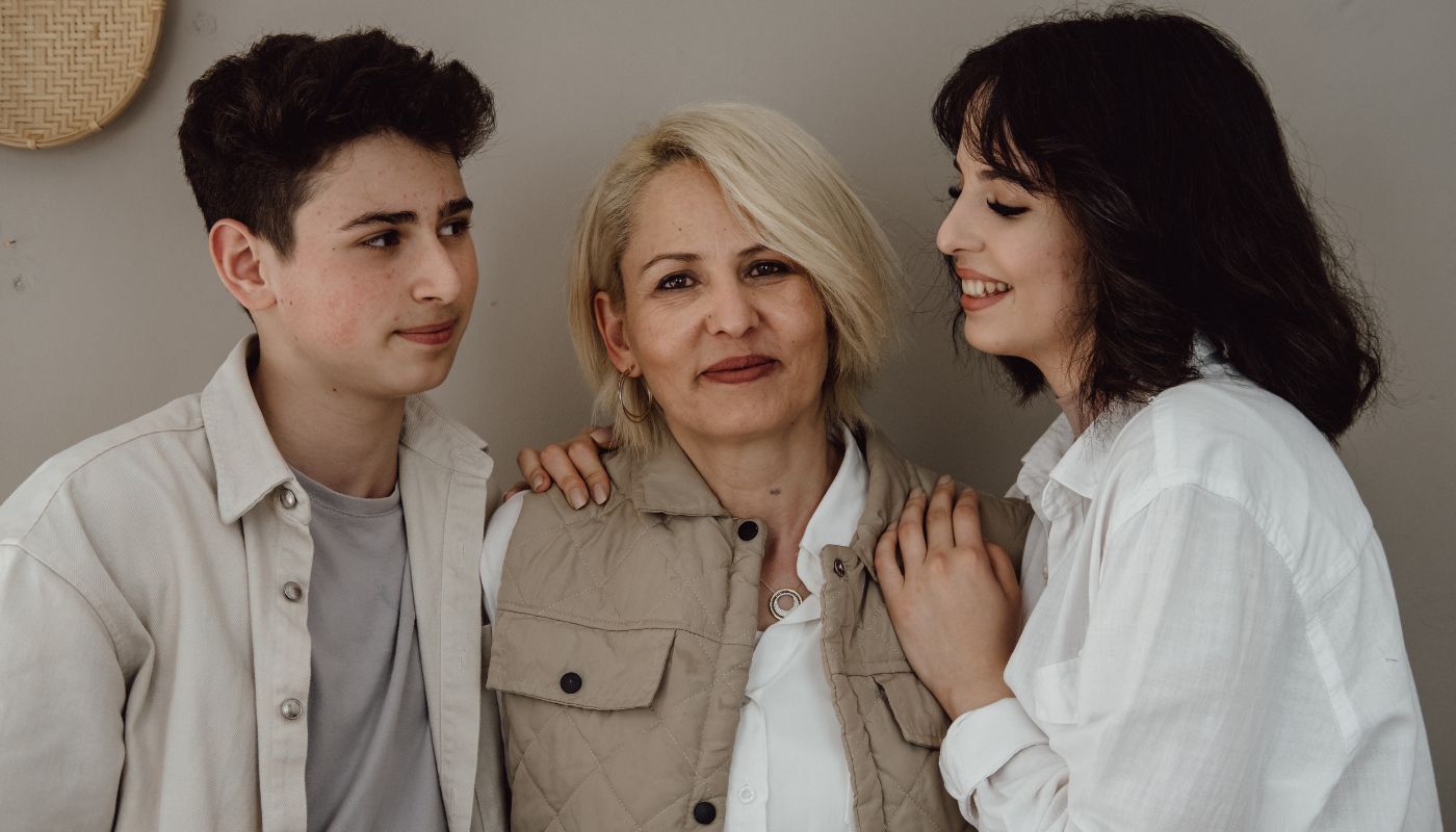 Mother with her two adult children.