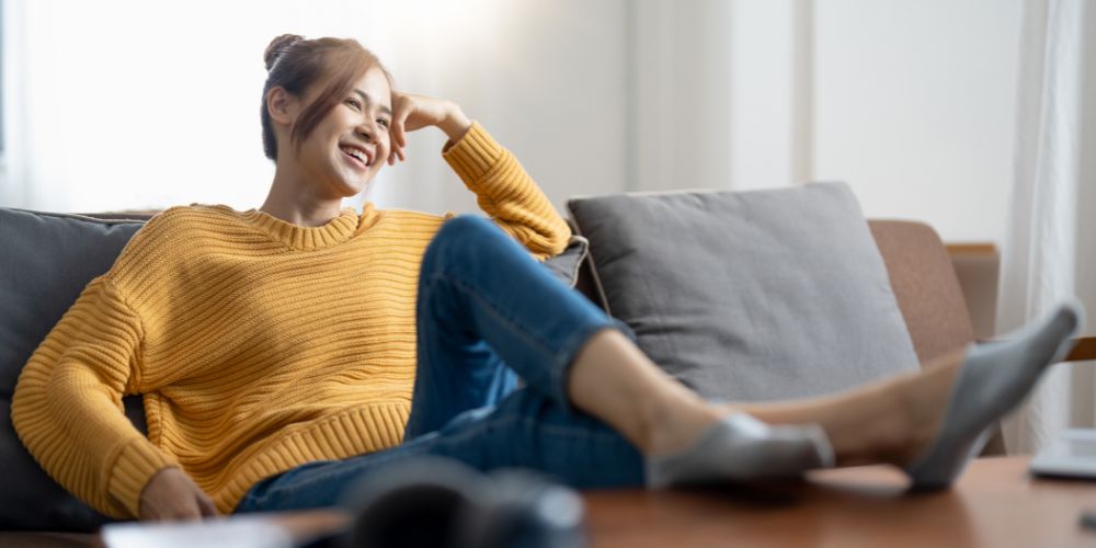 A person relaxing on the couch